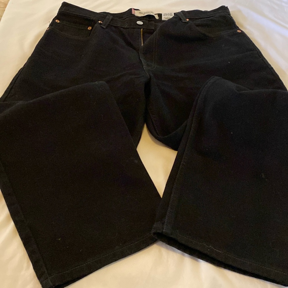 Black size 36, waist 32 length Levi Strauss and Company 550 relaxed fit jeans